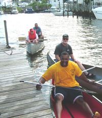 Several canoes maneuvering